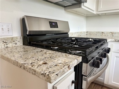 Step into quiet luxury with this beautifully rebuilt 3-bedroom on Pine Lakes Golf Club in Ohio - for sale on GolfHomes.com, golf home, golf lot