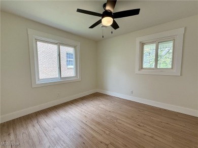 Step into quiet luxury with this beautifully rebuilt 3-bedroom on Pine Lakes Golf Club in Ohio - for sale on GolfHomes.com, golf home, golf lot