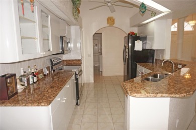 Impressive WATERFRONT 3 Bedroom, 2.5 Bathroom home with attached on Saint Andrews South Golf Club in Florida - for sale on GolfHomes.com, golf home, golf lot