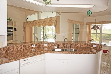 Impressive WATERFRONT 3 Bedroom, 2.5 Bathroom home with attached on Saint Andrews South Golf Club in Florida - for sale on GolfHomes.com, golf home, golf lot