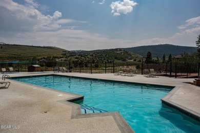 Discover the beauty of mountain living in this impeccably on Headwaters Golf Course At Granby Ranch in Colorado - for sale on GolfHomes.com, golf home, golf lot