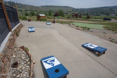 Discover the beauty of mountain living in this impeccably on Headwaters Golf Course At Granby Ranch in Colorado - for sale on GolfHomes.com, golf home, golf lot