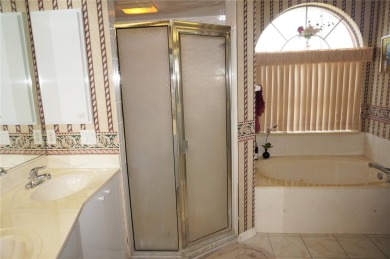 Impressive WATERFRONT 3 Bedroom, 2.5 Bathroom home with attached on Saint Andrews South Golf Club in Florida - for sale on GolfHomes.com, golf home, golf lot