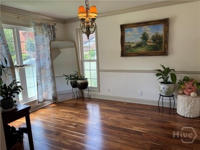 Enjoy life in this beautiful all-brick, low maintenance home in on Jennings Mill Country Club in Georgia - for sale on GolfHomes.com, golf home, golf lot
