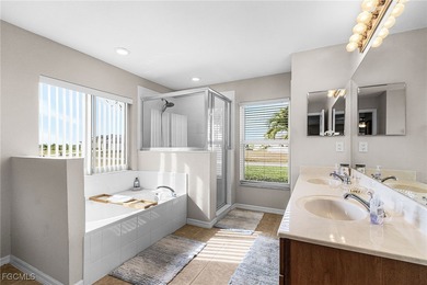 Discover pristine waterfront living in this exceptional on Burnt Store Golf Club in Florida - for sale on GolfHomes.com, golf home, golf lot