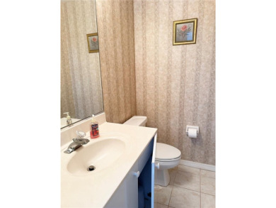 Impressive WATERFRONT 3 Bedroom, 2.5 Bathroom home with attached on Saint Andrews South Golf Club in Florida - for sale on GolfHomes.com, golf home, golf lot