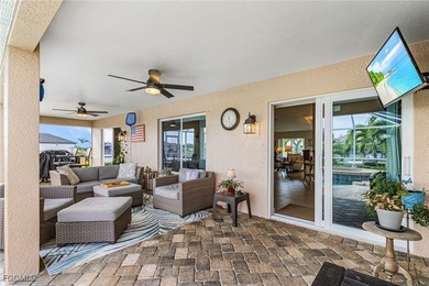 Discover pristine waterfront living in this exceptional on Burnt Store Golf Club in Florida - for sale on GolfHomes.com, golf home, golf lot