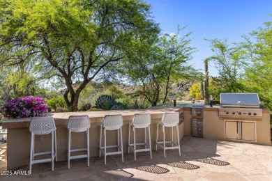Tucked behind the guard gates of prestigious Candlewood Estates on Troon North Golf Club  in Arizona - for sale on GolfHomes.com, golf home, golf lot