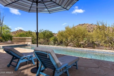 Tucked behind the guard gates of prestigious Candlewood Estates on Troon North Golf Club  in Arizona - for sale on GolfHomes.com, golf home, golf lot