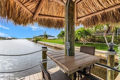 Discover pristine waterfront living in this exceptional on Burnt Store Golf Club in Florida - for sale on GolfHomes.com, golf home, golf lot