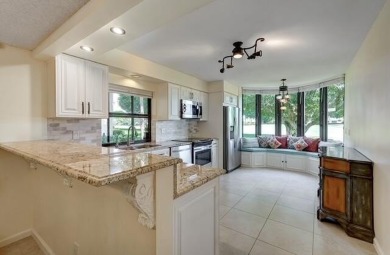 Welcome to 167 Waterbend Drive, an exquisite 2 bedrooms on Jonathans Landing Golf Club in Florida - for sale on GolfHomes.com, golf home, golf lot