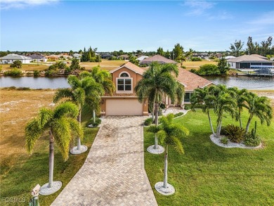 Discover pristine waterfront living in this exceptional on Burnt Store Golf Club in Florida - for sale on GolfHomes.com, golf home, golf lot