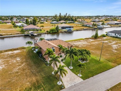 Discover pristine waterfront living in this exceptional on Burnt Store Golf Club in Florida - for sale on GolfHomes.com, golf home, golf lot