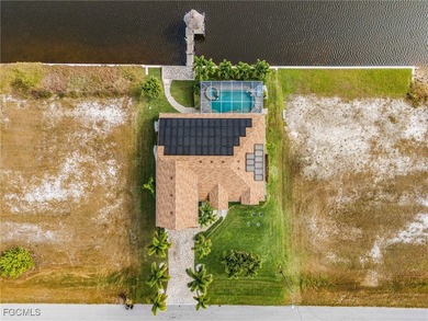 Discover pristine waterfront living in this exceptional on Burnt Store Golf Club in Florida - for sale on GolfHomes.com, golf home, golf lot