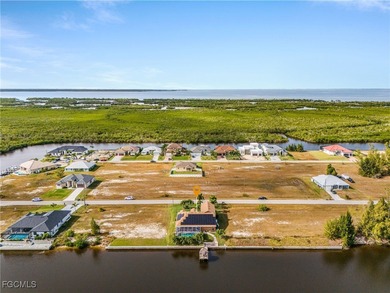 Discover pristine waterfront living in this exceptional on Burnt Store Golf Club in Florida - for sale on GolfHomes.com, golf home, golf lot