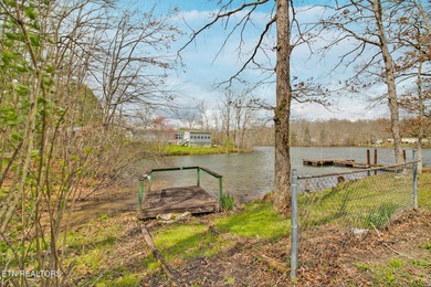 Charming lakefront living awaits in this spacious 2-bedroom on Lake Tansi Village Country Club in Tennessee - for sale on GolfHomes.com, golf home, golf lot