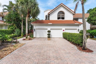 Experience modern elegance in this 4-bedroom, 3-bath condo with on Broken Sound Golf and Club  in Florida - for sale on GolfHomes.com, golf home, golf lot
