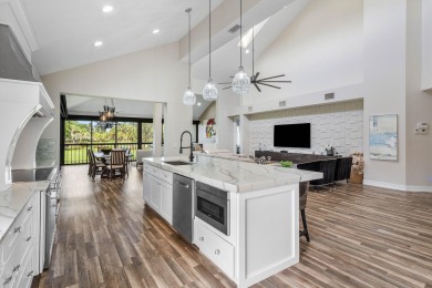 Experience modern elegance in this 4-bedroom, 3-bath condo with on Broken Sound Golf and Club  in Florida - for sale on GolfHomes.com, golf home, golf lot