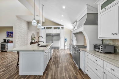 Experience modern elegance in this 4-bedroom, 3-bath condo with on Broken Sound Golf and Club  in Florida - for sale on GolfHomes.com, golf home, golf lot
