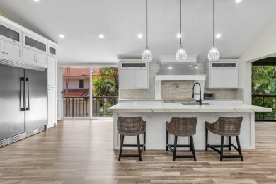 Experience modern elegance in this 4-bedroom, 3-bath condo with on Broken Sound Golf and Club  in Florida - for sale on GolfHomes.com, golf home, golf lot