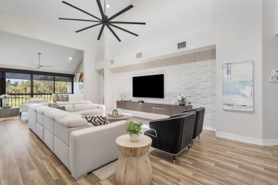 Experience modern elegance in this 4-bedroom, 3-bath condo with on Broken Sound Golf and Club  in Florida - for sale on GolfHomes.com, golf home, golf lot