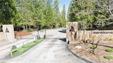 Nestled in the serene beauty of the San Bernardino Mountains on Lake Arrowhead Country Club in California - for sale on GolfHomes.com, golf home, golf lot