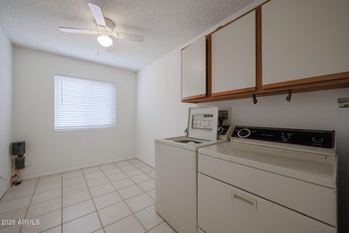 This well-maintained Capistrano offers vaulted ceilings that on Echo Mesa Golf Course in Arizona - for sale on GolfHomes.com, golf home, golf lot