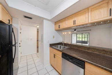 One or more photo(s) has been virtually staged. Discover this on Carrollwood Country Club in Florida - for sale on GolfHomes.com, golf home, golf lot