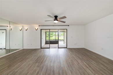 One or more photo(s) has been virtually staged. Discover this on Carrollwood Country Club in Florida - for sale on GolfHomes.com, golf home, golf lot