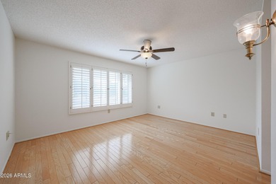 This well-maintained Capistrano offers vaulted ceilings that on Echo Mesa Golf Course in Arizona - for sale on GolfHomes.com, golf home, golf lot