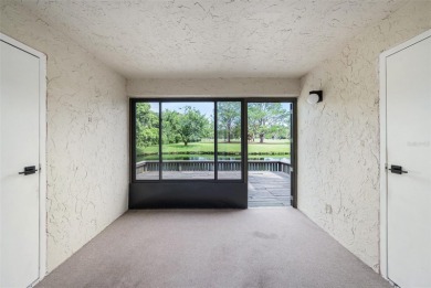 One or more photo(s) has been virtually staged. Discover this on Carrollwood Country Club in Florida - for sale on GolfHomes.com, golf home, golf lot