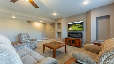 This exceptional residence has a wall of windows providing a on Osage National Golf Club in Missouri - for sale on GolfHomes.com, golf home, golf lot