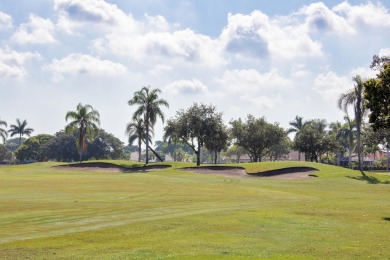 Nestled in the prestigious Atlantic National Golf and Country on Atlantic National Golf and Country Club in Florida - for sale on GolfHomes.com, golf home, golf lot