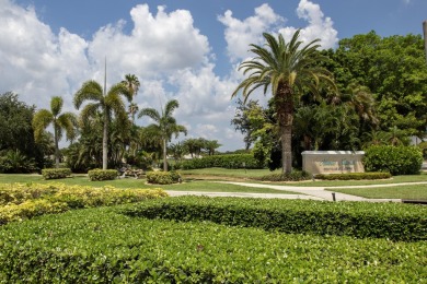 Nestled in the prestigious Atlantic National Golf and Country on Atlantic National Golf and Country Club in Florida - for sale on GolfHomes.com, golf home, golf lot