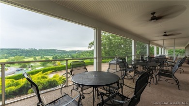 This exceptional residence has a wall of windows providing a on Osage National Golf Club in Missouri - for sale on GolfHomes.com, golf home, golf lot