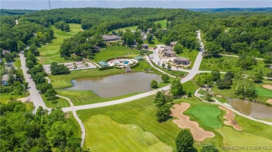 This exceptional residence has a wall of windows providing a on Osage National Golf Club in Missouri - for sale on GolfHomes.com, golf home, golf lot