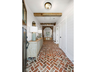 This handsome custom-built Coastal Farmhouse is certainly one of on Charleston National Golf Club in South Carolina - for sale on GolfHomes.com, golf home, golf lot