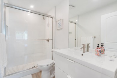 This turnkey 2-Bedroom, 2-bathroom corner unit townhouse in the on PGA National Golf Club in Florida - for sale on GolfHomes.com, golf home, golf lot