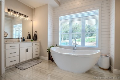 Introducing East Villages! An exquisite lakefront property on The Club At Porto Cima in Missouri - for sale on GolfHomes.com, golf home, golf lot