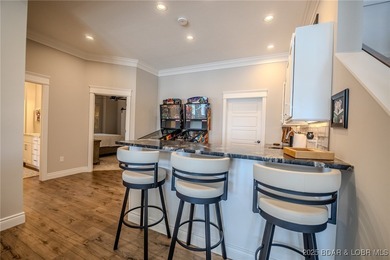 Introducing East Villages! An exquisite lakefront property on The Club At Porto Cima in Missouri - for sale on GolfHomes.com, golf home, golf lot