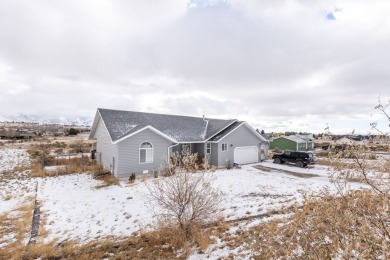 This charming home features 3 bedrooms and 2 bathrooms on Spring Creek Golf Course in Nevada - for sale on GolfHomes.com, golf home, golf lot