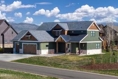 Stunning Custom Home on a Corner Lot with Mountain Views. This on Grand Elk Ranch and Club in Colorado - for sale on GolfHomes.com, golf home, golf lot