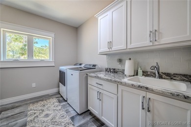 Introducing East Villages! An exquisite lakefront property on The Club At Porto Cima in Missouri - for sale on GolfHomes.com, golf home, golf lot