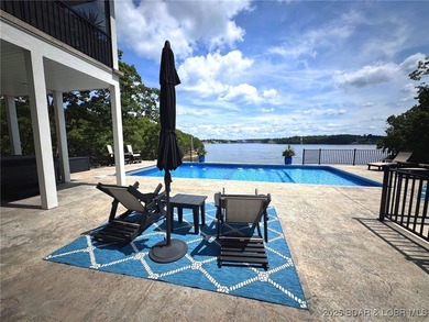 Introducing East Villages! An exquisite lakefront property on The Club At Porto Cima in Missouri - for sale on GolfHomes.com, golf home, golf lot