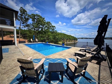 Introducing East Villages! An exquisite lakefront property on The Club At Porto Cima in Missouri - for sale on GolfHomes.com, golf home, golf lot