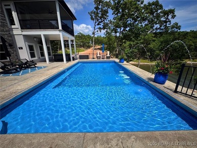 Introducing East Villages! An exquisite lakefront property on The Club At Porto Cima in Missouri - for sale on GolfHomes.com, golf home, golf lot