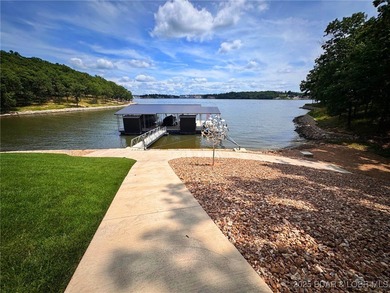 Introducing East Villages! An exquisite lakefront property on The Club At Porto Cima in Missouri - for sale on GolfHomes.com, golf home, golf lot