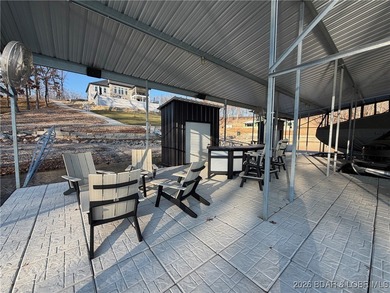 Introducing East Villages! An exquisite lakefront property on The Club At Porto Cima in Missouri - for sale on GolfHomes.com, golf home, golf lot