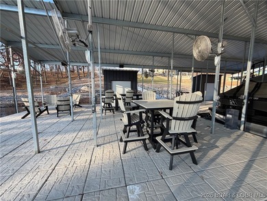 Introducing East Villages! An exquisite lakefront property on The Club At Porto Cima in Missouri - for sale on GolfHomes.com, golf home, golf lot