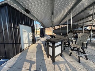 Introducing East Villages! An exquisite lakefront property on The Club At Porto Cima in Missouri - for sale on GolfHomes.com, golf home, golf lot